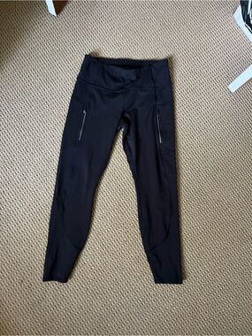 Black Athleta Rainier Zip-Pocket Leggings